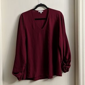 Red v-neck blouse
